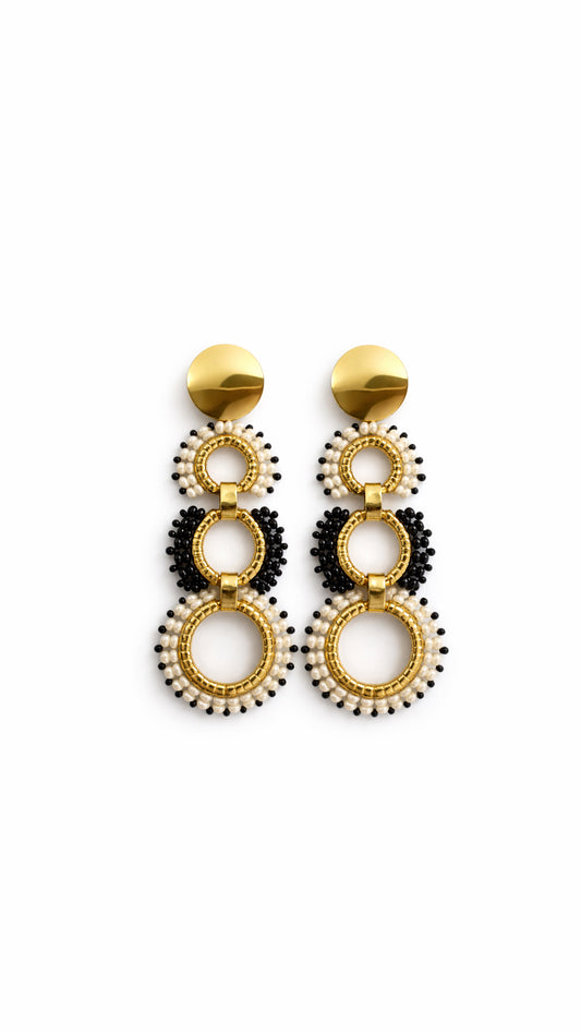 ARETES TEJIDO